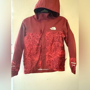 The North Face Burgundy Jacket with Contour Design 
Like new